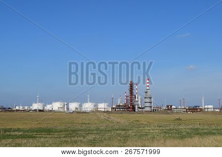 Distillation Columns, Pipes And Other Equipment Furnaces Refinery. The Oil Refinery. Equipment For P