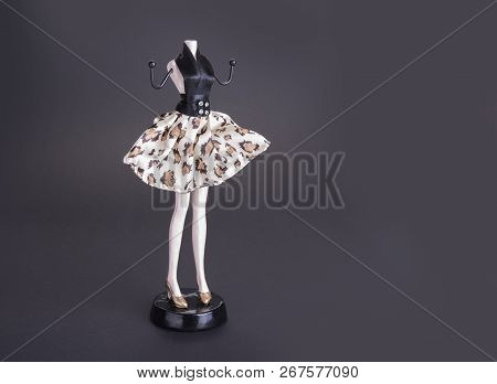 Mannequin As A Rack With Long Legs And Skirt On The Stand