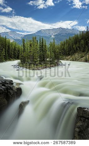 Sunwapta Falls With Small Island In The Middle Of The River. Long Exposition. Canada, Jasper Nationa
