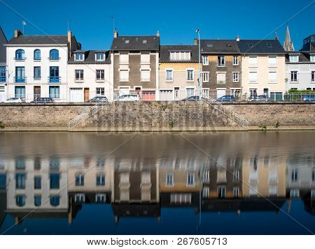 Reflections In The Sarthe River At Le Mans, France.