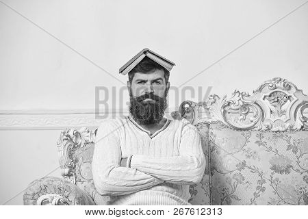 Macho Sits With Open Book On Head, Like Roof. Guy, Teacher Overdid With Teaching, Became Crazy Profe