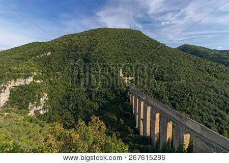 View Of The Bridge Of Tower (ponte Delle Torri) Medieval Aqueduct With The Fortress (fortilizio Dei 