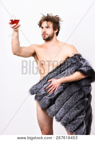 Sexy Sleepy Rich Macho Tousled Hair Drink Wine Isolated On White. Guy Attractive Rich Posing Fur Coa