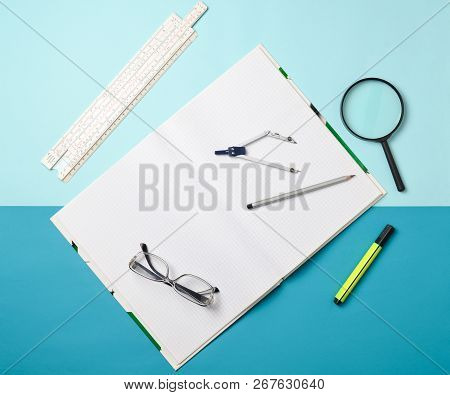 A Large Notebook For Notes And Drafting With Stationery Objects For A Student On A Pastel Background
