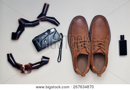 Men's Leather Shoes, Film Camera On A Pastel Background. Male Style. Hipster Look..