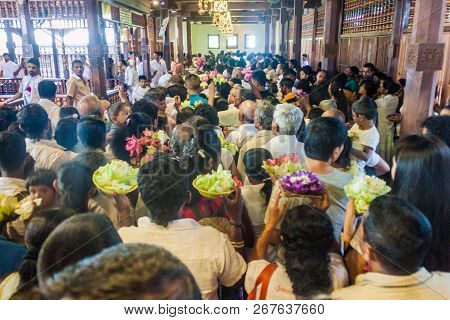 Kandy, Sri Lanka - July 19, 2016: White Clothed Buddhist Devotees In The Temple Of Sacred Tooth Reli