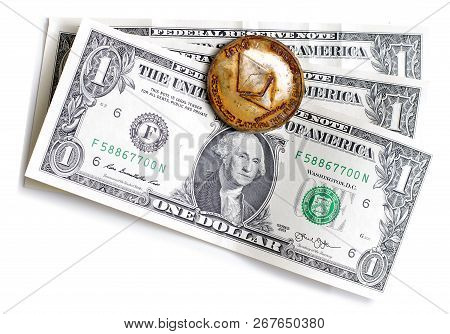 Prostejov Czech Rep. 8th November 2018 Rusty And Dirty Ethereum Coin Laying On One Dollar Notes. No 