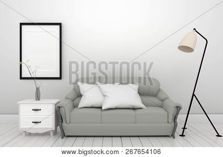 The Interior Gray Sofa Lamp And Frame On Empty White Wall Background,3d Rendering