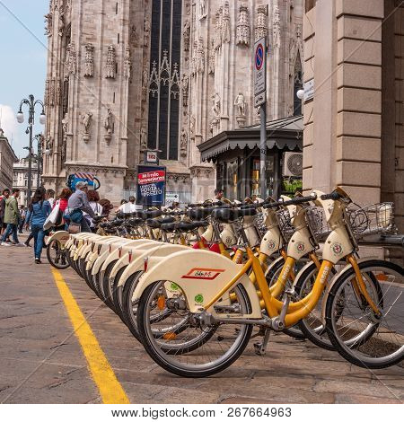 Milan, Italy - 09 May 2018: Yellow Bikemi Bicycles For Rent In A Parking Spot