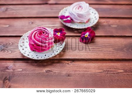Sweet Dessert White, Pink Zephyr Marshmallows On Clay Plate And Rustic Wooden Background.marshmallow