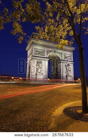 The Triumphal Arch In Evening, Paris, France.