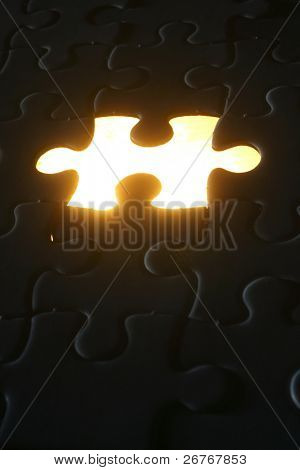 Licht von einem fehlende Puzzleteil.