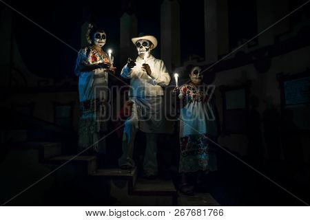 Merida, Cementerio General, Mexico - 31 October 2018: Customed Man With Candles And Pointing And Two