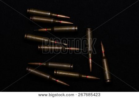 Rifle Military Ammo On Black Background. Symbolizes War For Money- Biggest Problem In World.