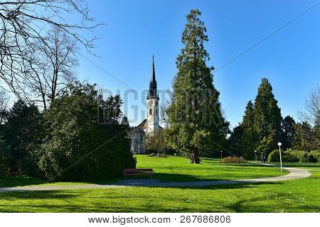 Villette-park In The Town Of Cham On A Spring Sunny Day. View Of The Saint Jacob Church. Cham, Canto
