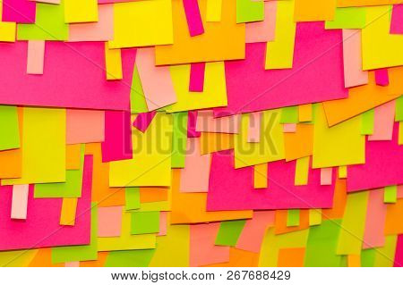 Bright Multi-colored Stickers On The Office White Board.