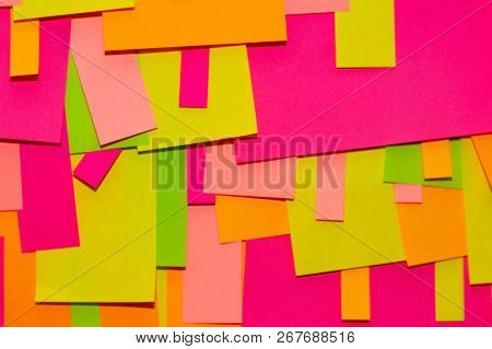 Bright Multi-colored Stickers On The Office White Board.