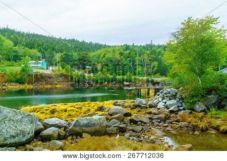 Views Of The Bay, Boats And Waterfront Buildings In The Fishing Village Aspotogan, Nova Scotia, Cana