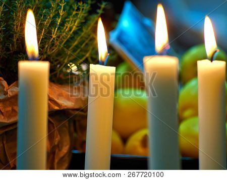 Candles Light On A Dining Table To Create Romantic Atmosphere In A Restaurant