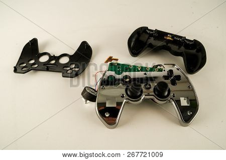 Photo Of Broken Gamepad Joystick On White Backrgound