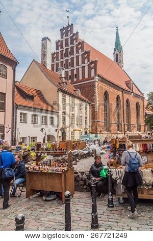 Riga, Latvia - August 19, 2016: View Of Skarnu Iela Street And St Johns Church In The Center Of Riga