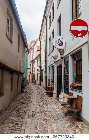 Riga, Latvia - August 19, 2016: Narrow Cobbled Alley Troksnu Iela In The Center Of Riga, Latvia