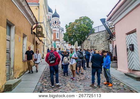 Tallinn, Estonia - August 22, 2016: Tourist At Pikk Jalg Street In The Old Town In Tallinn, Estonia.