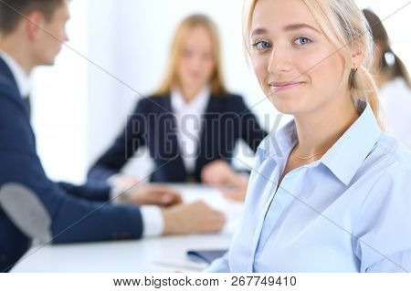 Group Of Business People Or Lawyers Discussing Terms Of Transaction In Office. Focus At Young Busine