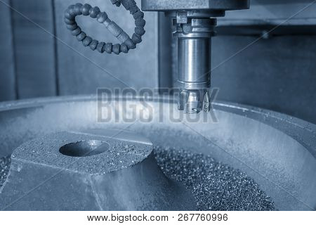 The  Cnc Milling Machine Cutting The Mold Part With The Face-mill Tool.the Hi-technology Manufacturi