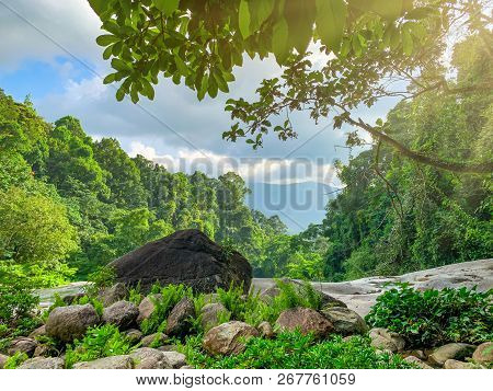 Beautiful Forest And Mountain With Blue Sky And White Cumulus Clouds. Tropical Green Tree Forest. Na
