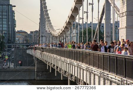 Russia, Moscow - May 13, 2018 People Walkin On Krymsky Bridge