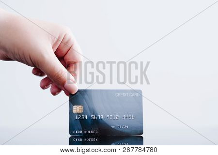 Online Payments Made Easy With Credit Card. Personal Finances And Money Management. Hand Holding Ban