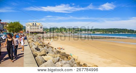 Hendaye, France - June 8: Tourists And Surfers Enjoy The Beach Of The Charming Seaside Resort Of Hen