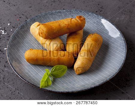 Latin-american Appetizers Called Tequenos Made Of Fried Corn Filled With Cheese.