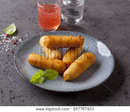 Latin-american Appetizers Called Tequenos Made Of Fried Corn Filled With Cheese.
