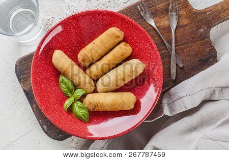 Latin-american Appetizers Called Tequenos Made Of Fried Corn Filled With Cheese.