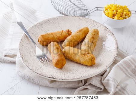 Latin-american Appetizers Called Tequenos Made Of Fried Corn Filled With Cheese.