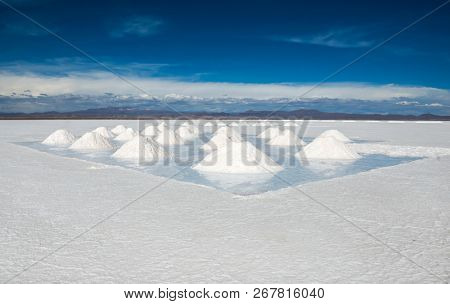 Sunshine scenery of area with salt banks in Salar de Uyuni in Bolivia