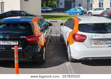 MOSCOW - JUN 20, 2018: Two Mercedes Benz cars of Moscow carsharing company You drive, carsharing is system of short-term car rental