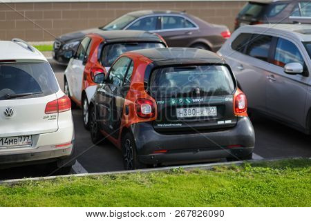 MOSCOW - JUN 22, 2018: Two Mercedes Smart cars of Moscow carsharing company You drive are among other cars, carsharing is system of short-term car rental