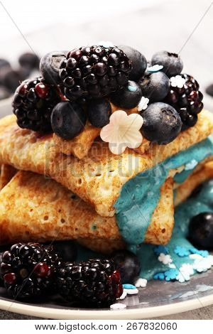 Delicious Tasty Homemade Crepes Or Pancakes With Blackberries,blueberries And Blue Spirulina Nicecre