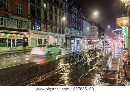 Copenhagen, Denmark - August 28, 2016: Night Rainy View Of Vesterbrogade Street In Copenhagen, Denma