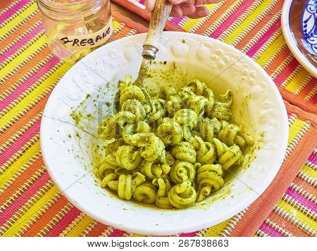 Trottole Al Pesto, Typical Pasta Of Campania, On A Rustic Trattoria Presentation.