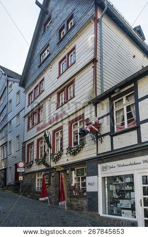 Monschau, Germany, October 2018 - Picturesque Timber Framed Christmas Shop In The Historic Center Of