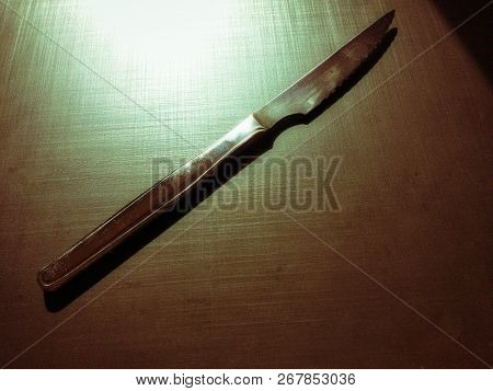 Full Metal Table Knife On A Dark Background, Table Knife, Cutlery, Dark Background, Metallic Materia