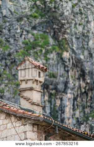 Small Chimney On The Roof Of The Historical Residential Building In The Kotor Old Town, Montenegro