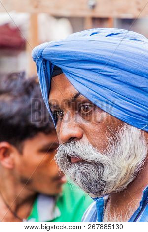 Delhi, India - October 22, 2016: Face Of A Sikkh Cyclo Rickshaw Driver In The Center Of Delhi, India