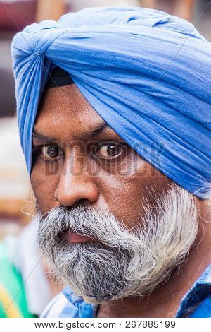 Delhi, India - October 22, 2016: Face Of A Sikkh Cyclo Rickshaw Driver In The Center Of Delhi, India