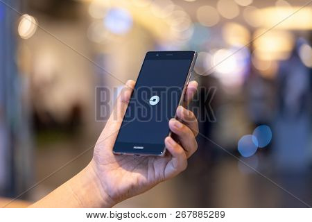 Chiang Mai, Thailand - Oct. 28,2018: Man Holding Huawei With Uber Apps. Uber Is Smartphone App Trans