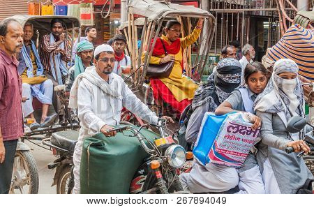 Varanasi, India - October 25, 2016: Traffic On A Busy Crowded Street In Varanasi, India